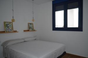 Apartamentos Cala San Pedro में एक कमरे में एक या कई बेड