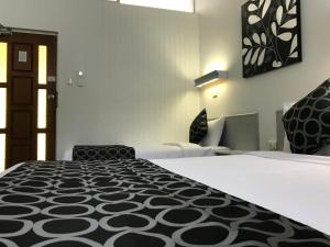 Krevet ili kreveti u jedinici u objektu Coffs Shearwater Motel