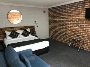 Krevet ili kreveti u jedinici u objektu Coffs Shearwater Motel