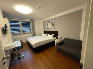 Cama ou camas em um quarto em Hotel Teatro