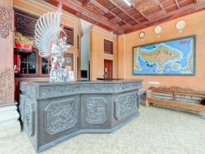 Denpasar şehrindeki Super OYO 3261 Hotel Ratu tesisine ait fotoğraf galerisinden bir görsel