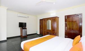 Katil atau katil-katil dalam bilik di FabHotel Wateredge Beach Resort