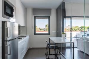 Eldhús eða eldhúskrókur á Sevilla Green Suites