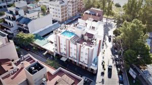 an overhead view of a city with buildings at Hotel Arona in Villa Carlos Paz