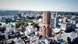 an aerial view of a city with buildings at Hotel Arona in Villa Carlos Paz