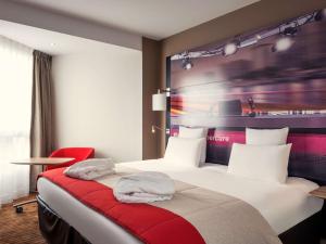 Una cama o camas en una habitación de Mercure Paris Boulogne