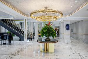 Lobby/Rezeption in der Unterkunft Hotel Savoy Homann