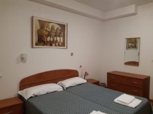 Cama ou camas em um quarto em Foresteria Valdese Venezia