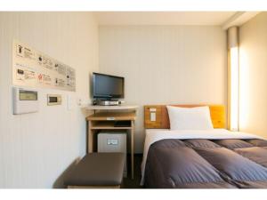 TV i/ili multimedijalni sistem u objektu R&B Hotel Kumagaya Ekimae - Vacation STAY 14848v