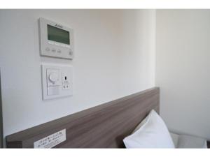 מיטה או מיטות בחדר ב-R&B Hotel Hakata Ekimae 2 - Vacation STAY 16429v