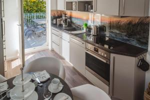 Una cocina o cocineta en Ferienwohnung Windspiel