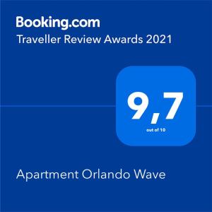 Sertifikāts, apbalvojums, norāde vai cits dokuments, kas ir izstādīts apskatei naktsmītnē Apartment Orlando Wave