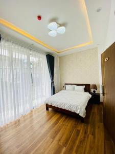 Posteľ alebo postele v izbe v ubytovaní Mỹ Lan hotel