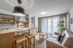 O zonă de relaxare la Apartment Torri di Seefeld