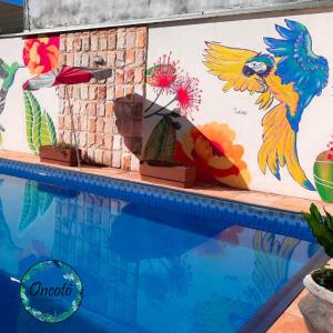 The swimming pool at or close to Oncotô Palmas Hostel