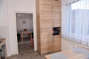 Кухня или кухненски бокс в Apartmán Lydie