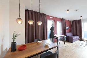 Un lugar para sentarse en Brera Serviced Apartments Frankfurt West