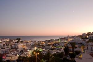 a view of a city at night at Cerro Mar Atlantico & Cerro Mar Garden in Albufeira