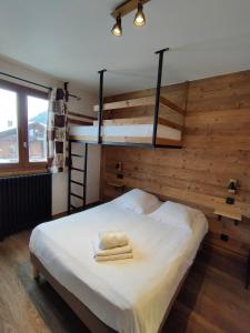 Cama ou camas em um quarto em Hôtel le Christiania