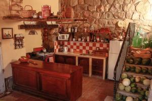 A kitchen or kitchenette at El Rastrojo - Casa de campo