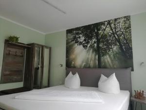 เตียงในห้องที่ Hotel Wandersleben - Erfurt