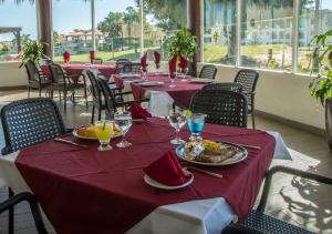 Park Royal Homestay Los Cabos 레스토랑 또는 맛집