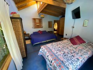 Pisco Elqui HolidayHome房間的床