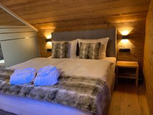 Chalet RelaxAlp Garfrescha में एक कमरे में एक या कई बेड