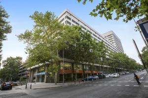 a rendering of a building on a city street at Pierre & Vacances Apartamentos Edificio Eurobuilding 2 in Madrid