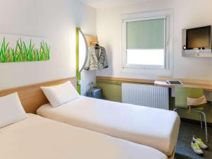 Voodi või voodid majutusasutuse ibis budget Genève Petit-Lancy toas