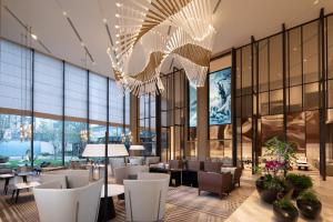 Televizorius ir (arba) pramogų centras apgyvendinimo įstaigoje Crowne Plaza Foshan Nanhai - an IHG Hotel