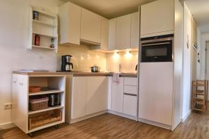 Una cocina o kitchenette en Stadtwohnung 1