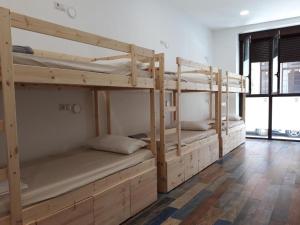 เตียงในห้องที่ Hub Hostel Seville