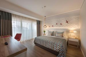 Кровать или кровати в номере Akra Kemer - Ultra All Inclusive