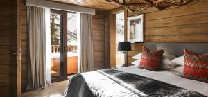 Gulta vai gultas numurā naktsmītnē El Lodge, Ski & Spa