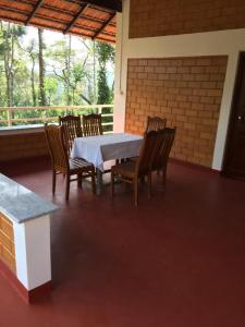 Nuotrauka iš apgyvendinimo įstaigos Coorg -Kunji Phad River View Homestay mieste Virajpet galerijos