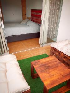 Tempat tidur dalam kamar di Casa Mirador guesthouse