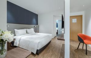 Cama ou camas em um quarto em Holiday Inn Express Changsha Shifu, an IHG Hotel