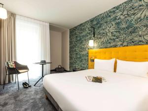 ibis Styles Puteaux Paris La Defense 객실 침대