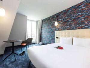 ibis Styles Puteaux Paris La Defense 객실 침대