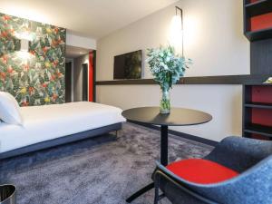 Krevet ili kreveti u jedinici u objektu ibis Styles Puteaux Paris La Defense