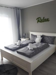 Cama ou camas em um quarto em Angel Residence