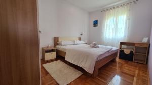 Apartment Antonia tesisinde bir odada yatak veya yataklar