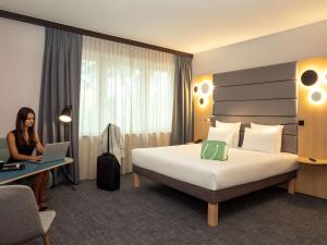 Voodi või voodid majutusasutuse Novotel Brussels Centre Midi toas