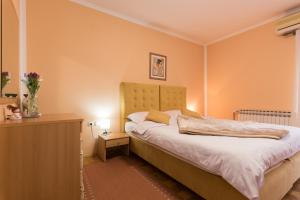 Кровать или кровати в номере Guest House Bagi