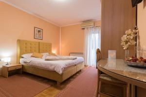 Кровать или кровати в номере Guest House Bagi