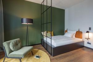 A bed or beds in a room at Black F House - Serviced Apartments