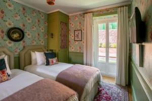 Krevet ili kreveti u jedinici u okviru objekta Rosegarden House - by Unlock Hotels