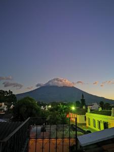 a view of a mountain in the distance at Hotel Posada San Pedro in Antigua Guatemala