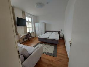 Krevet ili kreveti u jedinici u objektu Ferienwohnung Zum Rapunzelturm